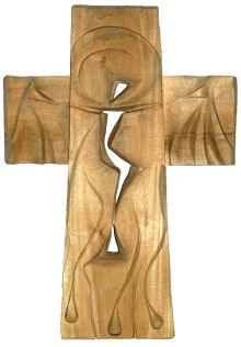 Ein steinernes Kreuz in dem die Silhouette von Jesus erkennbar ist.